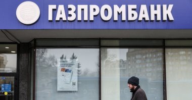 A man walks past a branch office of Gazprombank, Moscow, Russia, March 31, 2022. (Reuters Photo)