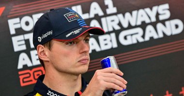 Red Bull Racing’s Dutch driver Max Verstappen drinks from a Red Bull can during a press conference ahead of the Abu Dhabi Formula One Grand Prix at the Yas Marina Circuit, Abu Dhabi, U.A.E, Dec. 5, 2024. (AFP Photo)