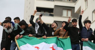 Syrian refugees celebrate the fall of the Assad regime, in the capital Ankara, Türkiye, Dec. 8, 2024. (EPA Photo) 