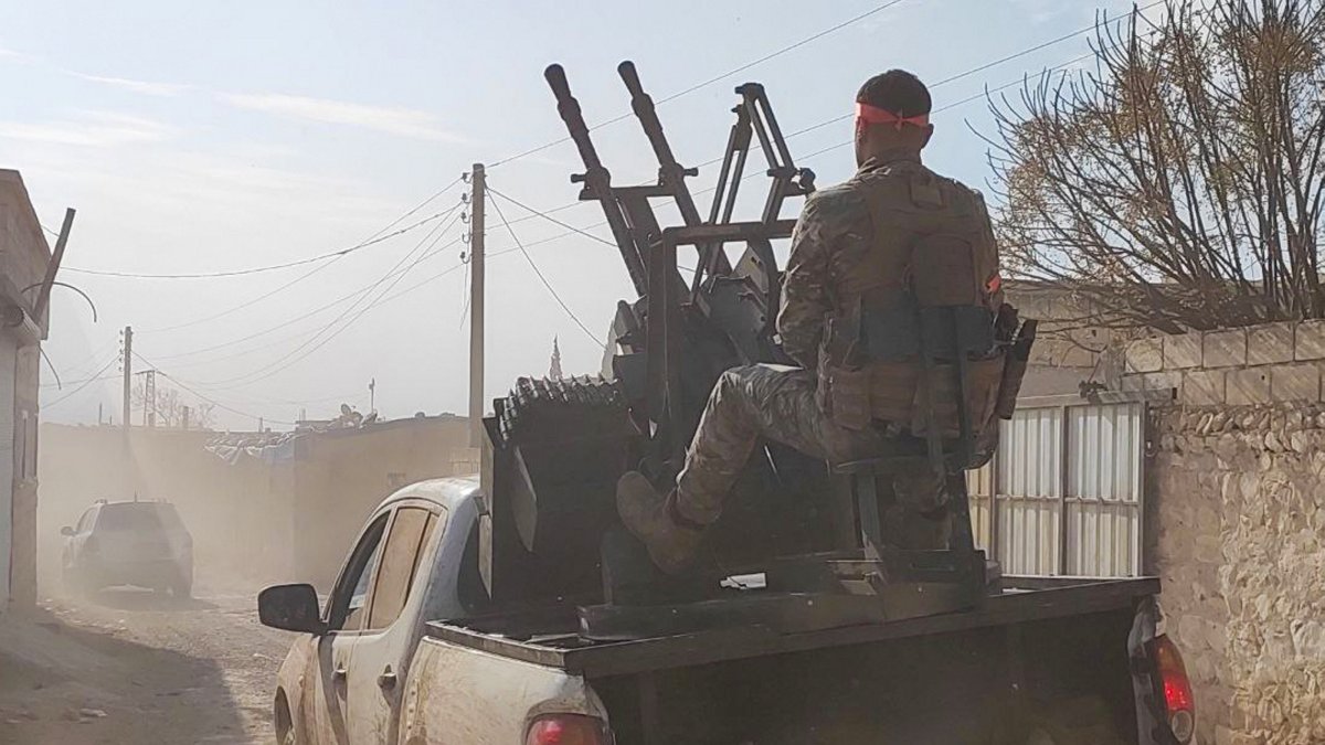 A Syrian National Army (SNA) vehicle advances into the district center of Manbij as they fight against the PKK/YPG terrorist group, northern Syria, Dec. 8, 2024. (AA Photo)