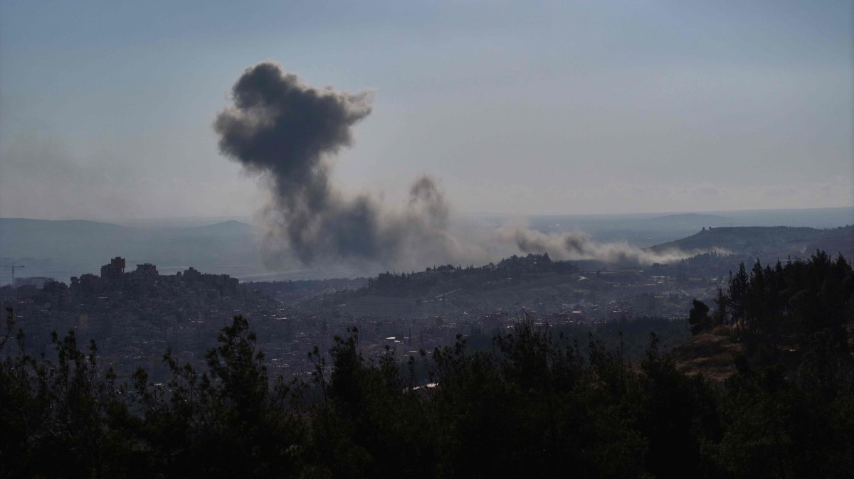 Smoke billows following an Israeli airstrike on the outskirts of Damascus, Syria, Dec. 8, 2024. (AFP Photo)