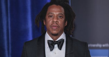 Jay Z poses for photographers upon arrival at the opening of the London Film Festival and the World premiere of the film "The Harder They Fall" in London, U.K., Oct. 6, 2021. (AP Photo)