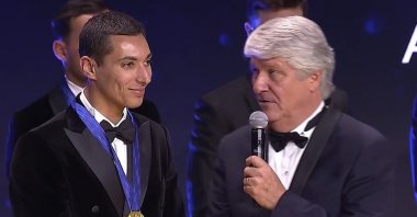 Turkish rider Toprak Razgatlıoğlu (L) being interviewed by FIM President Jorge Viegas at the FIM Awards Ceremony, Mallorca, Spain, Dec. 8, 2024. (AA Photo)