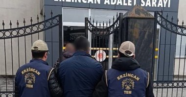 Police officers detain two FETÖ suspects in eastern Erzincan province, Türkiye, Nov. 23, 2024. (IHA Photo)