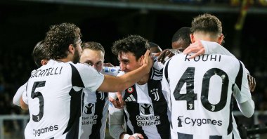 Juventus' Andrea Cambiaso (C) celebrates with teammates after scoring the opening goal during the Italian Serie A football match against US Lecce at the Via del Mare Stadium, Lecce, Italy, Dec. 1, 2024. (AFP Photo)