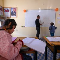 Zilan (F) and Barış (R) attend a class at their school in the Gevaş district of Van, eastern Türkiye, Dec. 10, 2024. (AA Photo)