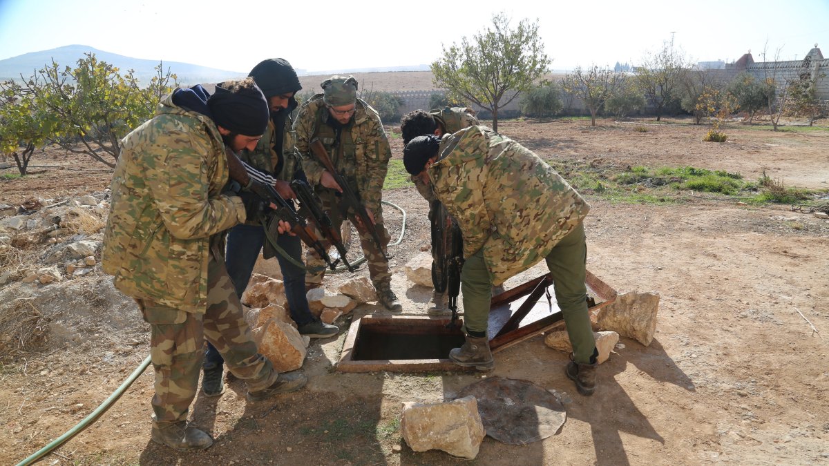 Syrian National Army (SNA) members check one of many underground tunnels where PKK/YPG members hide, Manbij, Syria, Dec. 10, 2024. (AA Photo)