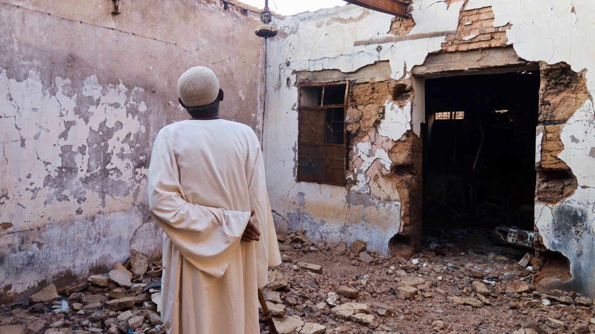 Hajj Ahmed, a resident of the Old-Omdurman neighborhood, looks at his house after it was damaged by shells in Omdurman, Sudan, Nov. 8, 2024. (Reuters Photo)