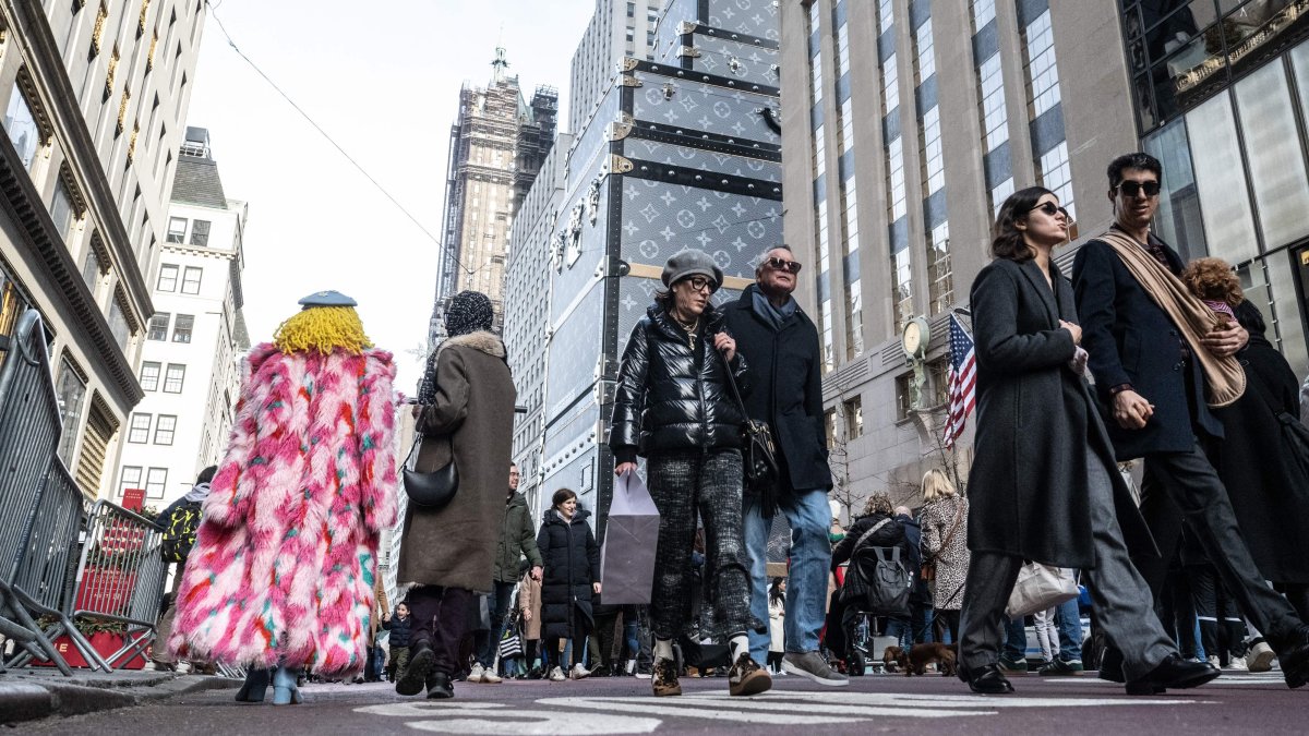 People walk along the iconic Fifth Ave, New York City, U.S., Dec. 8, 2024. (AFP Photo)