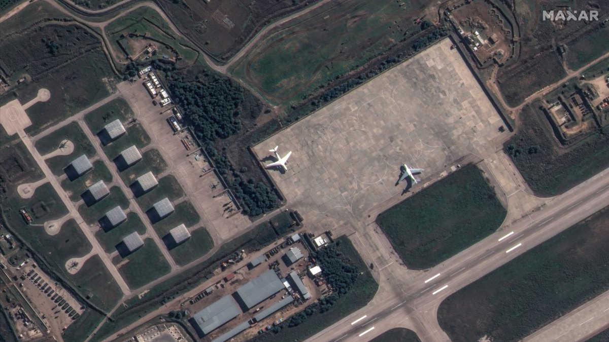 A satellite image shows Russian aircraft, helicopters and military equipment at Khmeimim airbase, near Latakia, Syria, Dec. 9, 2024. (Maxar Technologies/Handout via Reuters)