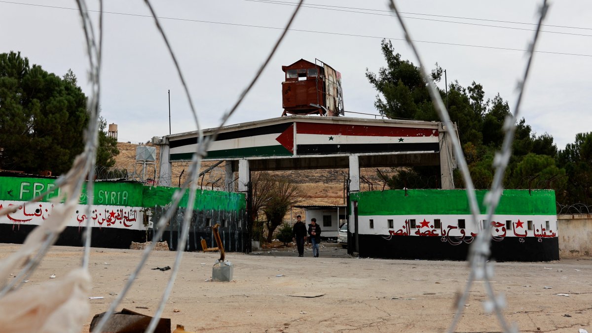 People walk as the search for prisoners at Sednaya prison continues after opposition seized the capital and announced that they had ousted the Assad regime in Sednaya, Syria, Dec. 11, 2024. (Reuters Photo)