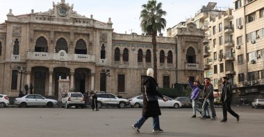 People walk along a street, after opposition forces seized the capital and ousted Syria's Bashar Assad, Damascus, Syria, Dec. 11, 2024. (Reuters Photo)