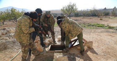Syrian National Army (SNA) members check one of many underground tunnels where PKK/YPG members hide, Manbij, Syria, Dec. 10, 2024. (AA Photo)