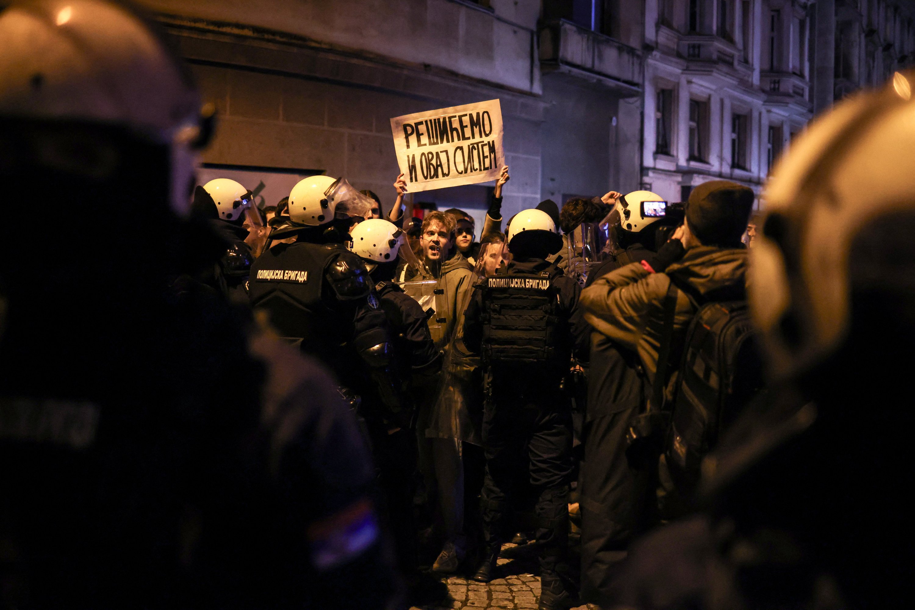 Students of Belgrade University protest as Serbian President Aleksandar Vucic holds a news conference in front of his office in Belgrade, Serbia, Dec. 11, 2024. (Reuters Photo)