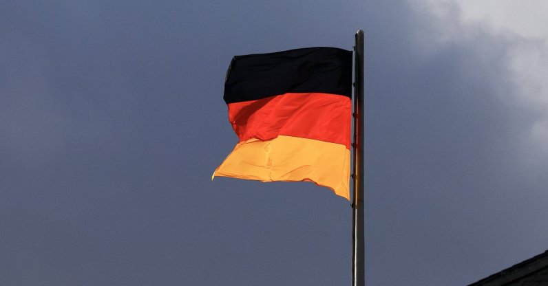 A German flag flutters in the wind atop the German parliament, Bundestag, Berlin, Germany, Nov. 18, 2024. (EPA Photo)