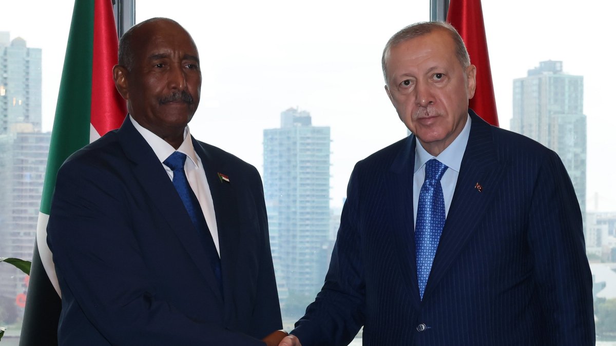 President Recep Tayyip Erdoğan and Abdel Fattah al-Burhan shake hands at the Turkish House in New York, Sept. 25, 2024. (AA Photo)