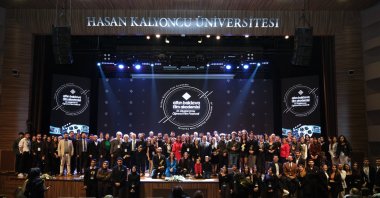 Award recipients and the festival team pose at the award ceremony of the festival, Istanbul, Türkiye, Dec. 12, 2024. (IHA Photo)