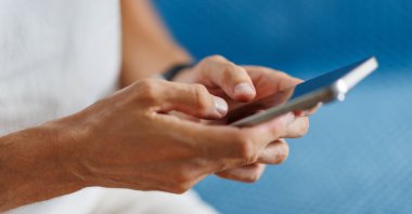 Fraudsters used fake identities and AI-generated personas on social media to trick victims into making multiple payments for nonexistent returns. (Shutter Stock Photo)