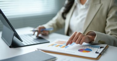 Seventeen percent of women overall report having to address personal or family responsibilities at work "daily” or "several times a day,” compared with 11% of men overall. (Shutterstock Photo)