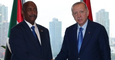 President Recep Tayyip Erdoğan and Abdel Fattah al-Burhan shake hands at the Turkish House in New York, Sept. 25, 2024. (AA Photo)