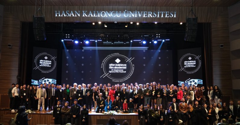 Award recipients and the festival team pose at the award ceremony of the festival, Istanbul, Türkiye, Dec. 12, 2024. (IHA Photo)