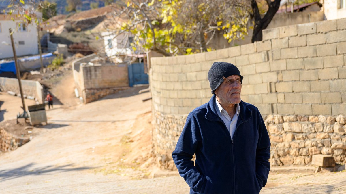 Mehmet Ertürk walks in his village in Kilis, southern Türkiye, Dec. 13, 2024. (AFP Photo)