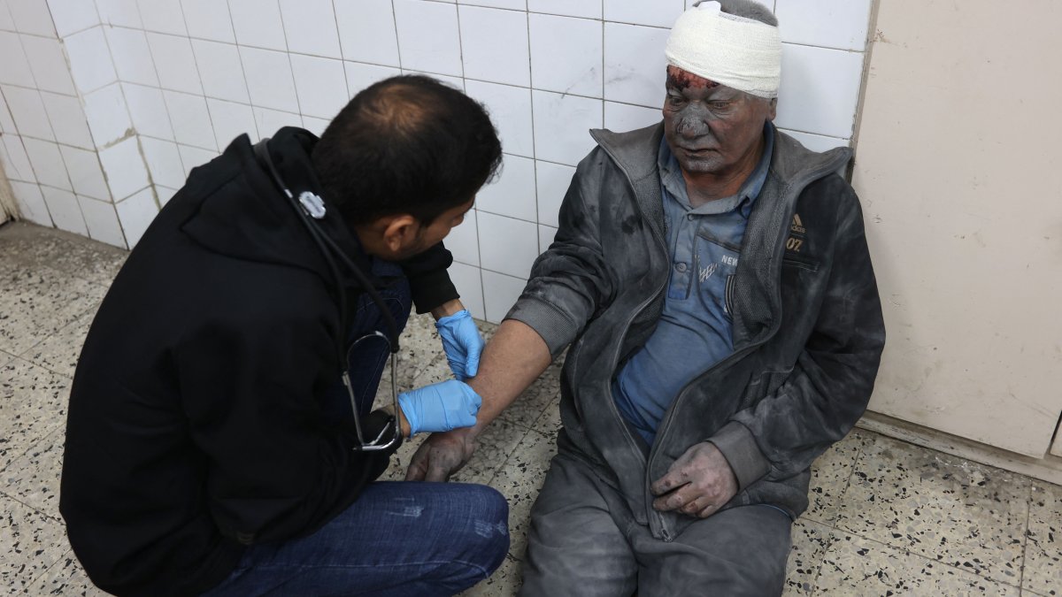 A wounded Palestinian man receives treatment at Al-Ahli Arab hospital, also known as the Baptist hospital, in Gaza City, central Gaza, Dec. 15, 2024. (AFP Photo)