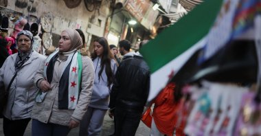 People walk at a traditional souq in the Bab Touma district of the Old City of Damascus, Syria, Dec. 14, 2024. (Reuters Photo)