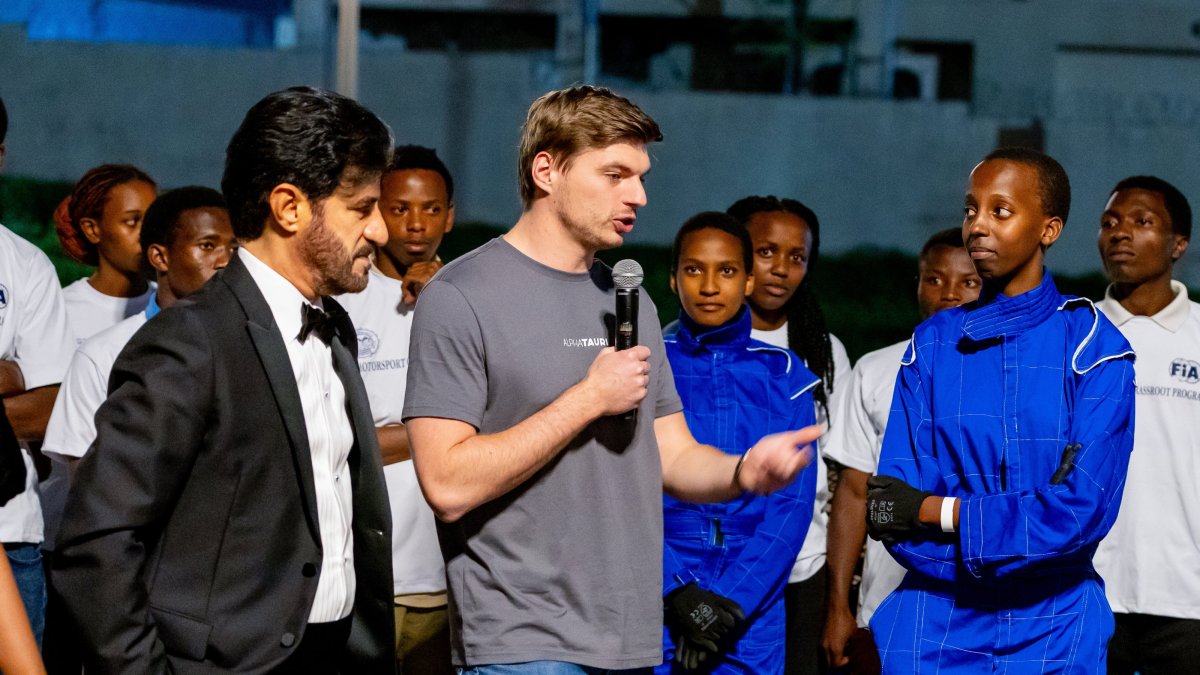 Max Verstappen (C) speaks as he does FIA-mandated community service, Kigali, Rwanda, Dec. 13, 2024. (EPA Photo)