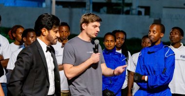 Max Verstappen (C) speaks as he does FIA-mandated community service, Kigali, Rwanda, Dec. 13, 2024. (EPA Photo)