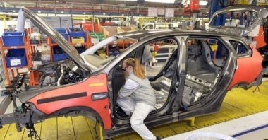 A worker is photographed at a production site of Tofaş, Bursa, northwestern Türkiye, Dec. 9, 2024. (IHA Photo)
