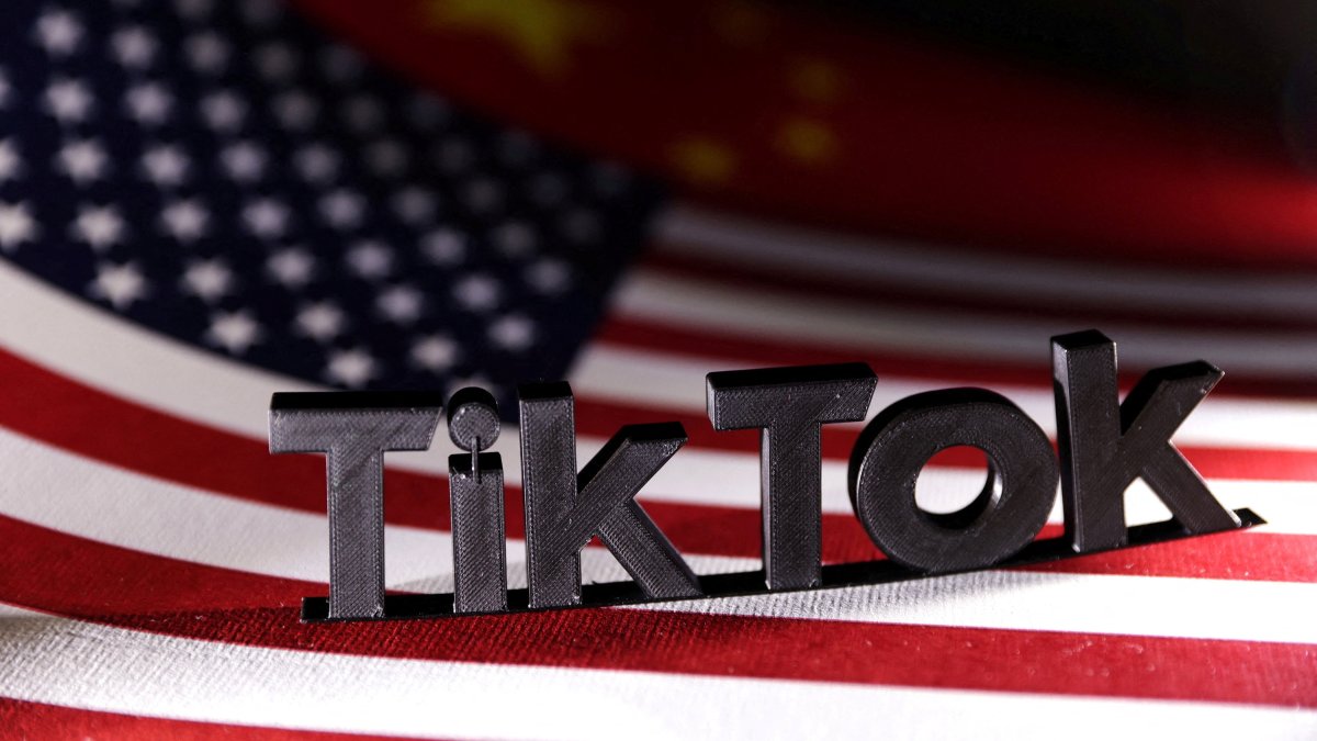 TikTok logo is placed on the U.S. and Chinese flags in this illustration taken, April 25, 2024. (Reuters Photo)