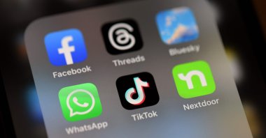 In this photo illustration, the TikTok logo is displayed on an iPhone screen in San Anselmo, California, U.S., Dec. 6, 2024. (AFP Photo)