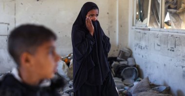 A young woman reacts following Israeli strikes on a UNRWA-run school in Khan Younis, southern Gaza, Palestine, Dec. 16, 2024. (AFP Photo)