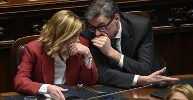 Italian Prime Minister Giorgia Meloni (L) speaks with Minister of Economy Giancarlo Giorgetti (R) as she reports at the Chamber of Deputies on the upcoming European Council in Rome, Italy, Dec. 17, 2024. (EPA Photo)