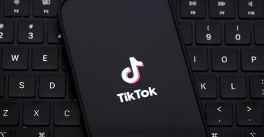 The TikTok logo is displayed on an iPhone screen in San Anselmo, California, U.S., Dec. 6, 2024. (AFP Photo)