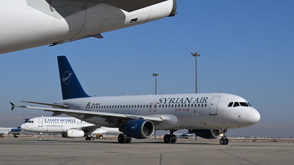 A Syrian Air aircraft taxis at the tarmac before a flight to the city of Aleppo, Damascus, Syria, Dec. 18, 2024. (AFP Photo)