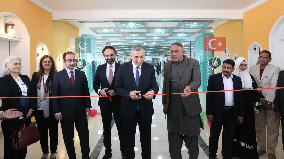 Turkish and Pakistani officials cut the ribbon at the opening of the conference hall, Islamabad, Pakistan, Dec. 17, 2024. (AA Photo)