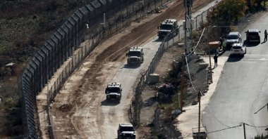 Israeli military vehicles drive toward the Syrian side of the border near the Druze village of Majdal Shams, the occupied Golan Heights, Syria, Dec. 16, 2024. (EPA Photo)