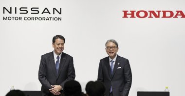 Nissan Chief Executive Makoto Uchida (L) and Honda President Toshihiro Mibe attend a joint news conference in Tokyo, Japan, March 15, 2024. (AP Photo)