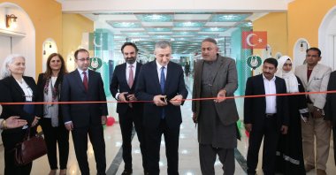 Turkish and Pakistani officials cut the ribbon at the opening of the conference hall, Islamabad, Pakistan, Dec. 17, 2024. (AA Photo)