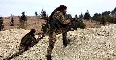SNA members secure an area in Manbij, Syria, Dec. 12, 2024. (AA Photo)