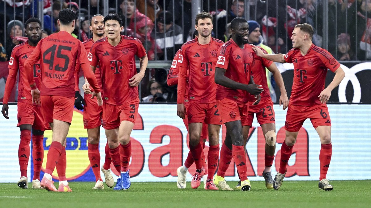 Bayern Munich players celebrate after a goal during the German Bundesliga match between Bayern Munich and 1. FC Heidenheim 1846, Munich, Germany, Dec. 7, 2024. (AP Photo)