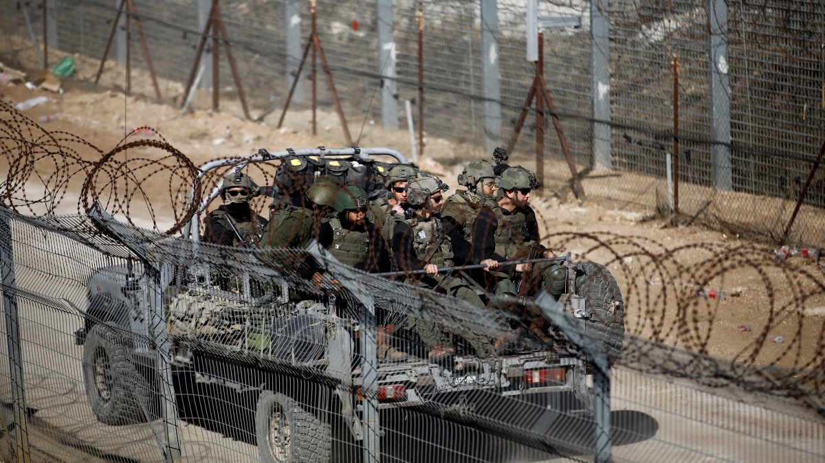 An Israeli military vehicle drives on the Israeli-occupied Golan Heights around the demilitarized buffer zone, southwest Syria, Dec. 16, 2024. (Reuters Photo)