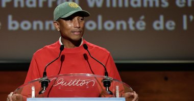 U.S. rapper, producer and fashion designer Pharrell Williams addresses a speech prior to a special screening of his movie &quot;Piece by Piece&quot; during his nomination as UNESCO Goodwill Ambassador for Arts, Education and Entrepreneurship, at the UNESCO headquarters in Paris, France, Dec. 17, 2024. (AFP Photo)