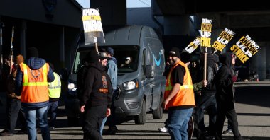 Amazon Teamsters union workers temporarily block an Amazon delivery truck as they picket outside an Amazon distribution center in San Francisco, California, U.S., Dec. 19, 2024. (AFP Photo)