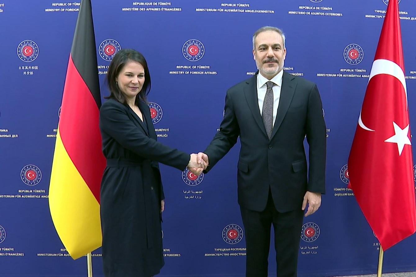 Foreign Minister Hakan Fidan and German counterpart Annalena Baerbock shake hands as they meet in Ankara, Dec. 20, 2024. (DHA Photo)