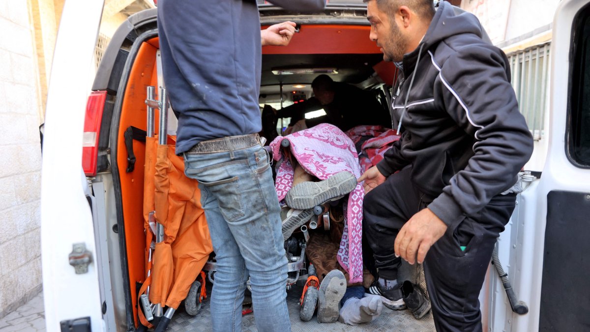 An ambulance carrying the bodies of people killed during an Israeli strike on Jabalia, in the northern Gaza Strip, arrives at Al-Ahli Arab Hospital, Gaza City, Palestine, Dec. 19, 2024. (AFP Photo)