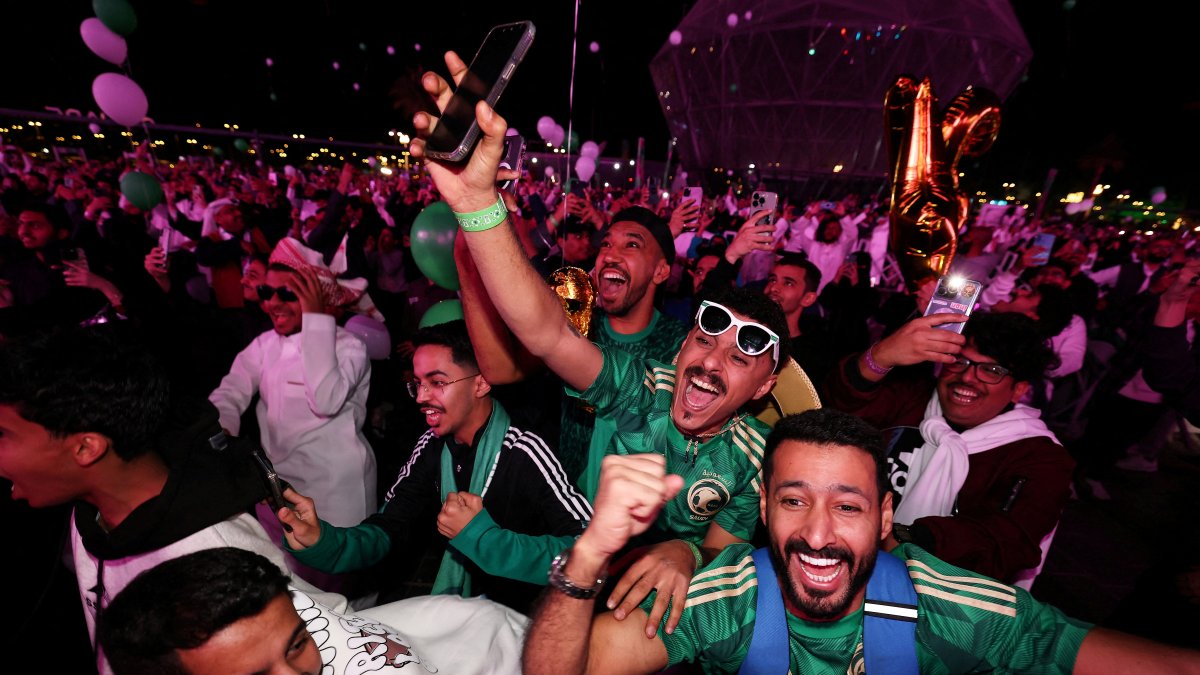 Fans celebrate as Saudi Arabia is announced as the host nation for the FIFA World Cup 2034, Riyadh, Saudi Arabia, Dec. 11, 2024. (Reuters Photo)