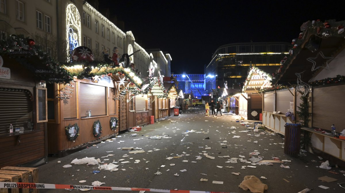 A view of the cordoned-off Christmas market after an incident in Magdeburg, Germany, Friday Dec. 20, 2024. (Heiko Rebsch/dpa via AP)